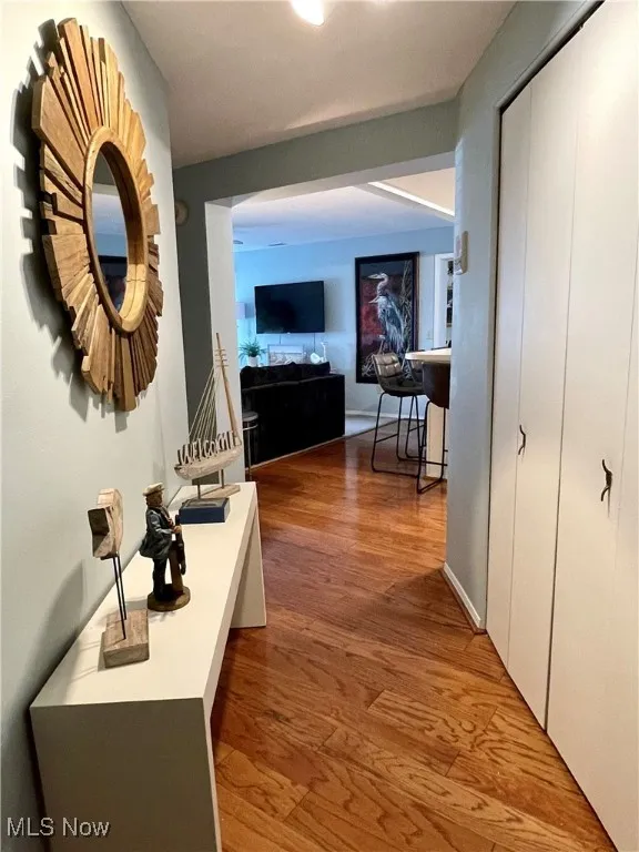 Hall with wood finished floors