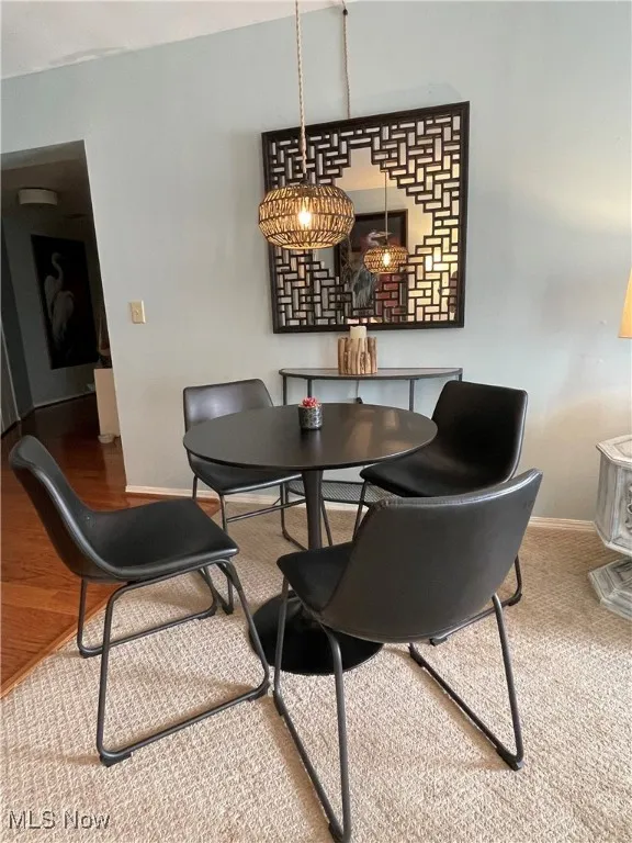 Dining area featuring baseboards