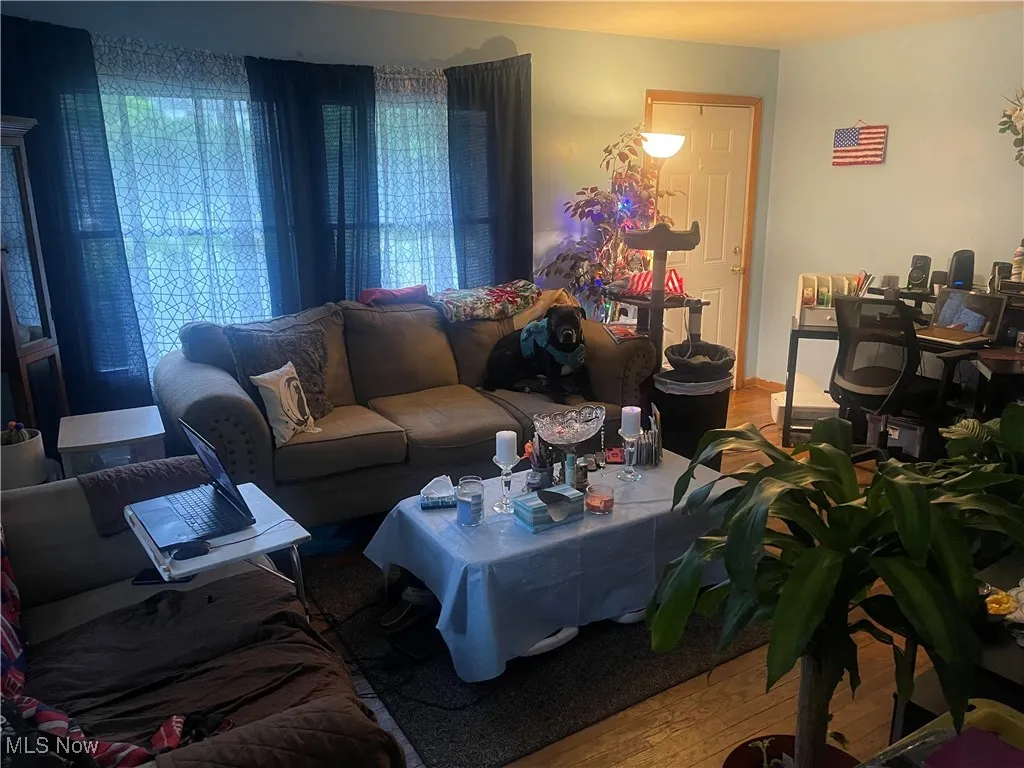 Living room with original hardwood flooring
