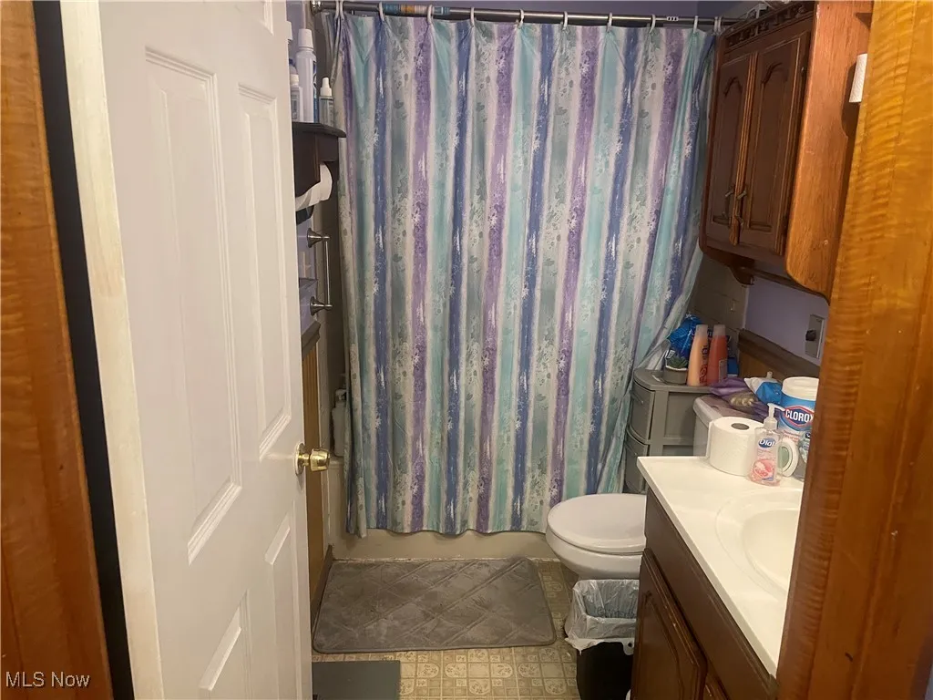 Bathroom with vanity and toilet