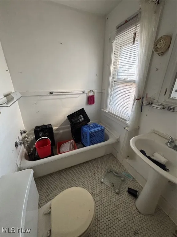 Bathroom featuring tile patterned flooring