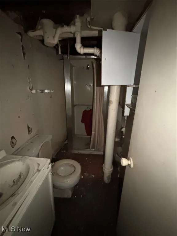 Bathroom with toilet and vanity