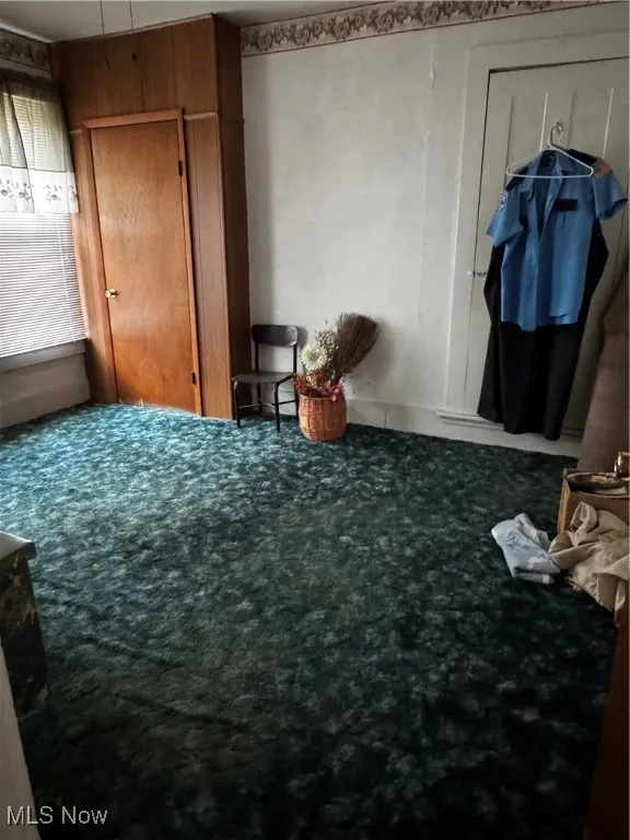 Bedroom featuring carpet flooring