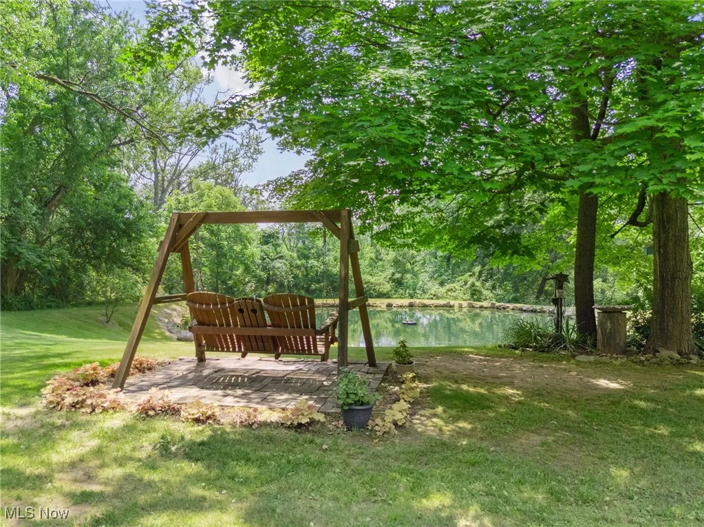 View of grassy yard featuring a water view