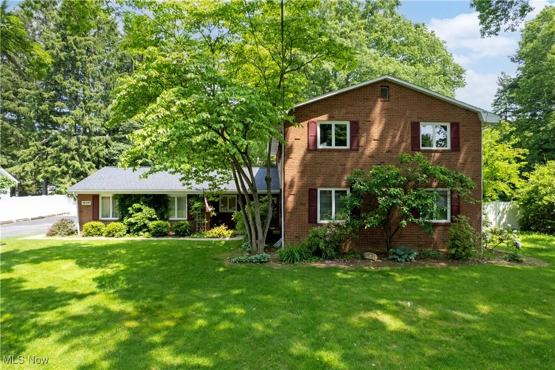 View of front of home with brick siding