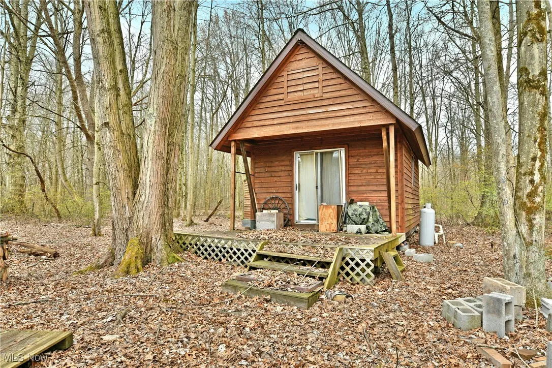 View of outbuilding with an outdoor structure