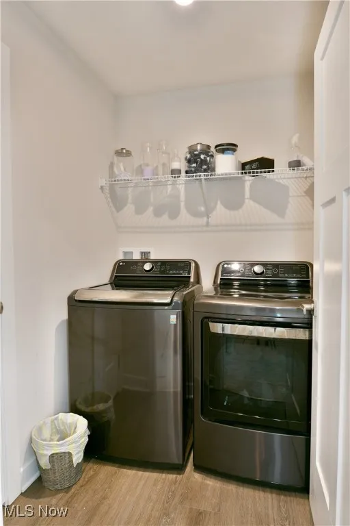 Upstairs laundry room next to main bedroom.