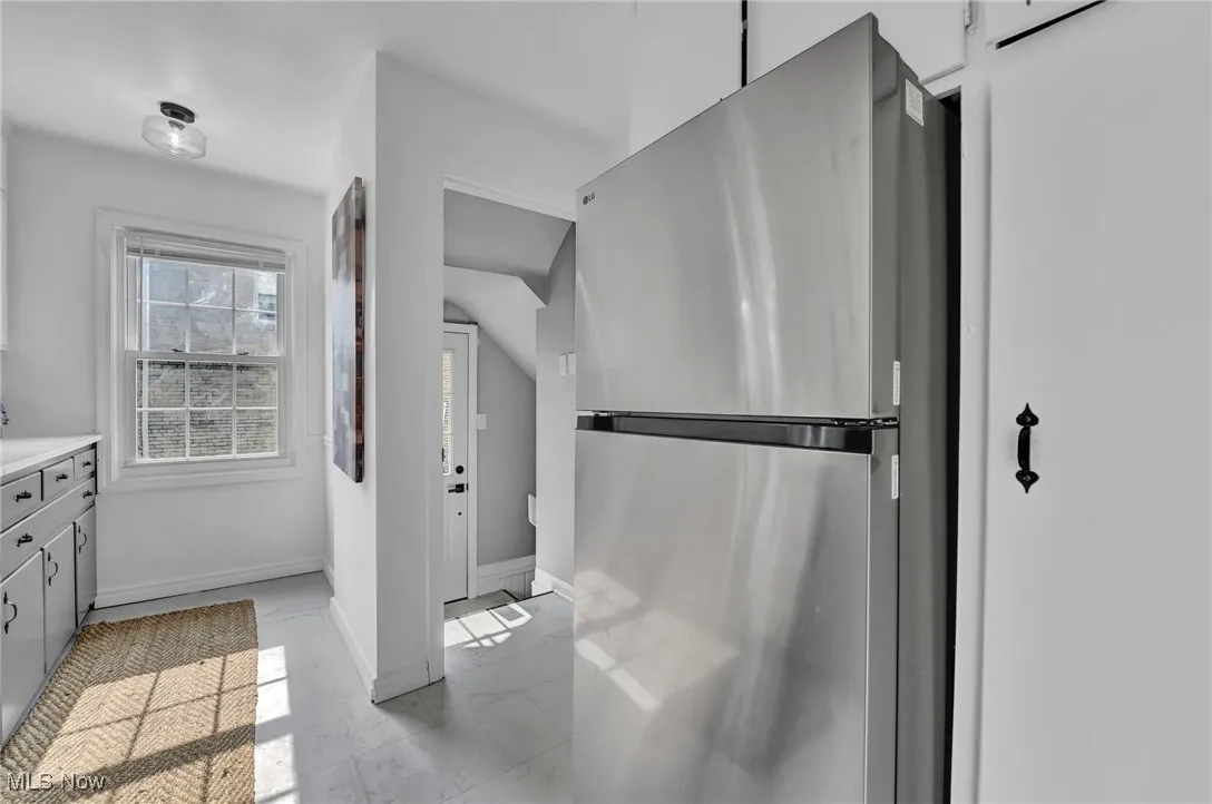 Bathroom featuring vanity and baseboards