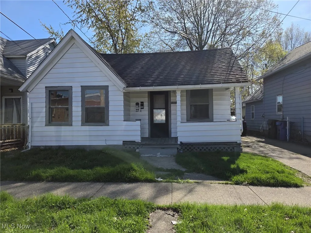 Bungalow-style house featuring covered porch