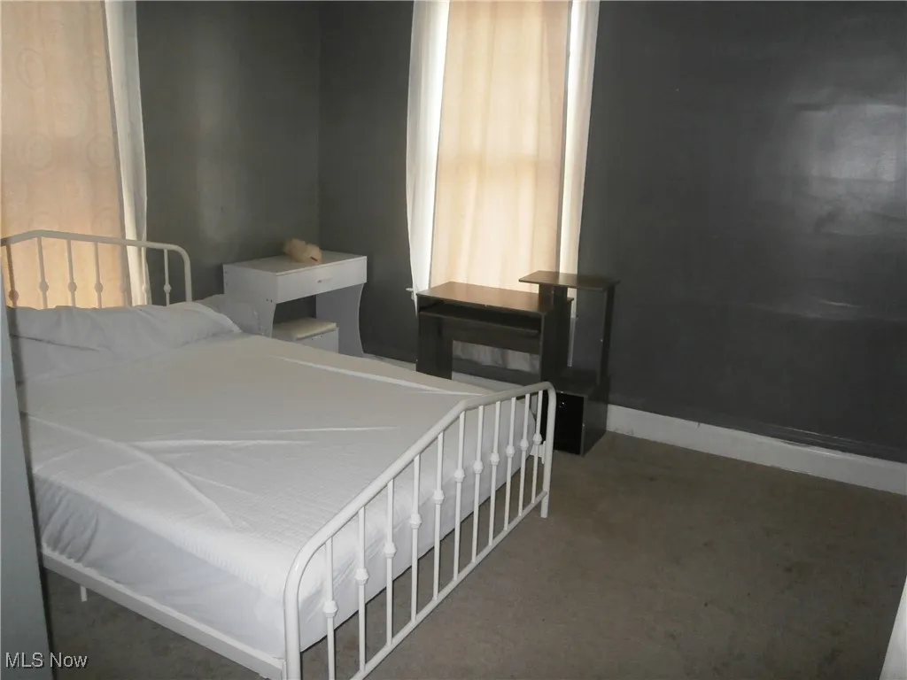 Bedroom featuring carpet flooring