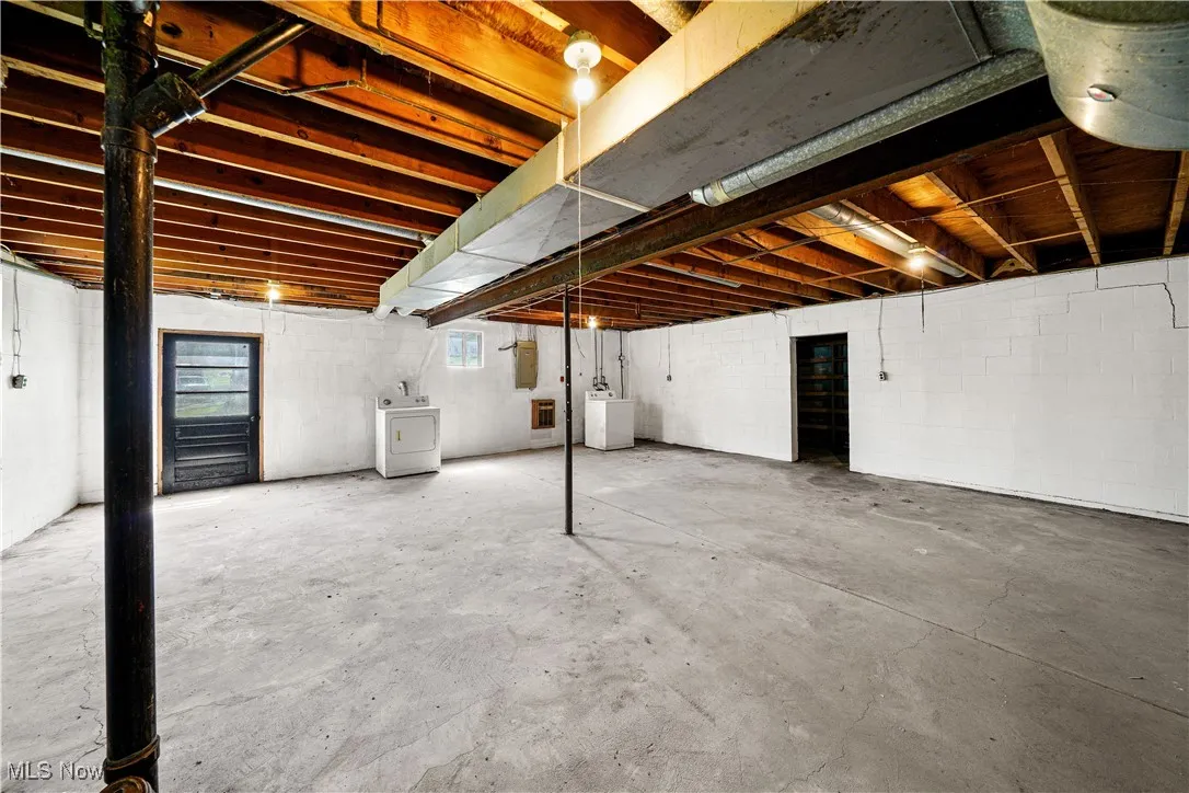 Below grade area with washer / dryer