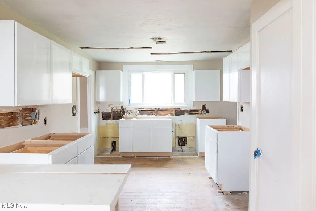 Kitchen with white cabinets