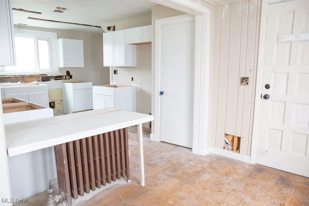 Kitchen with white cabinets