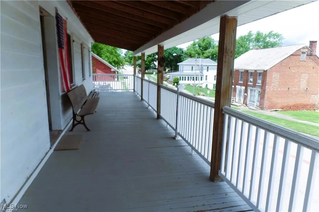 Wooden deck featuring a residential view