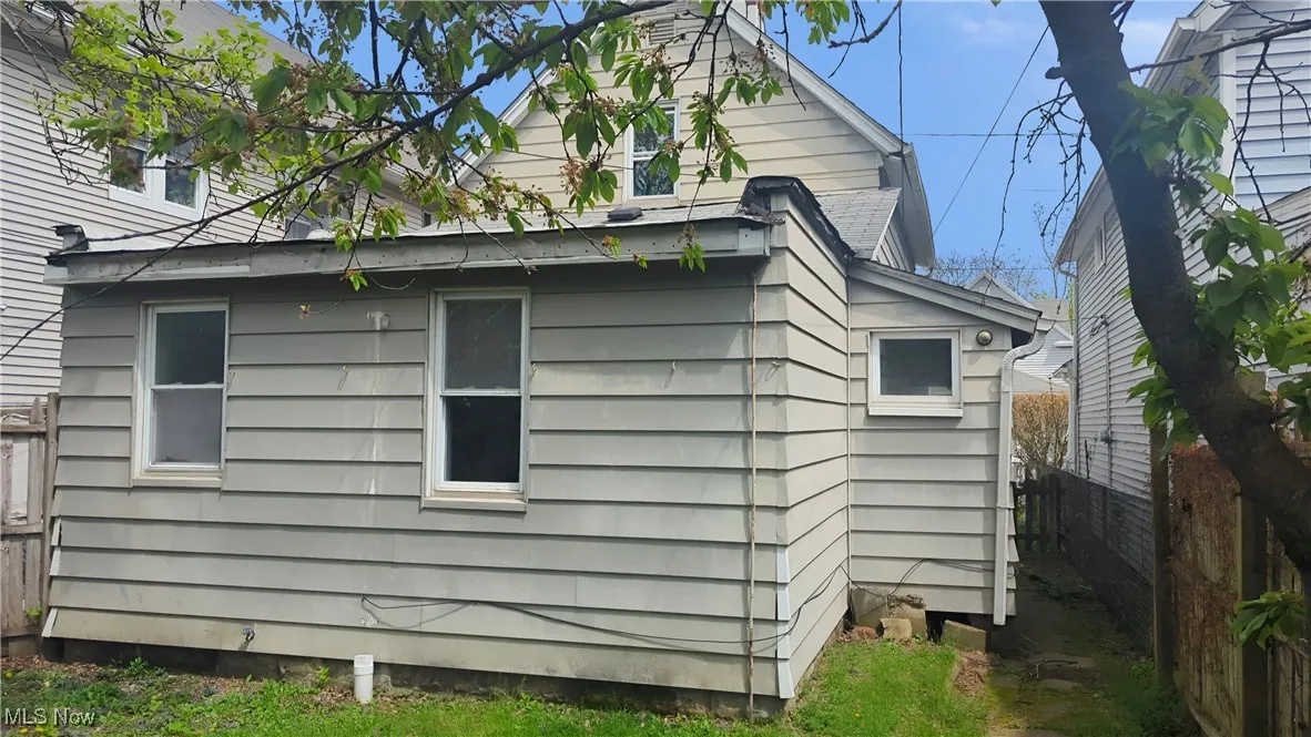 View of property exterior with fence