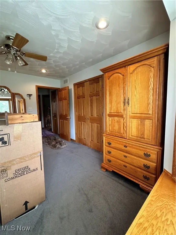 Bedroom with carpet floors, recessed lighting, and ceiling fan