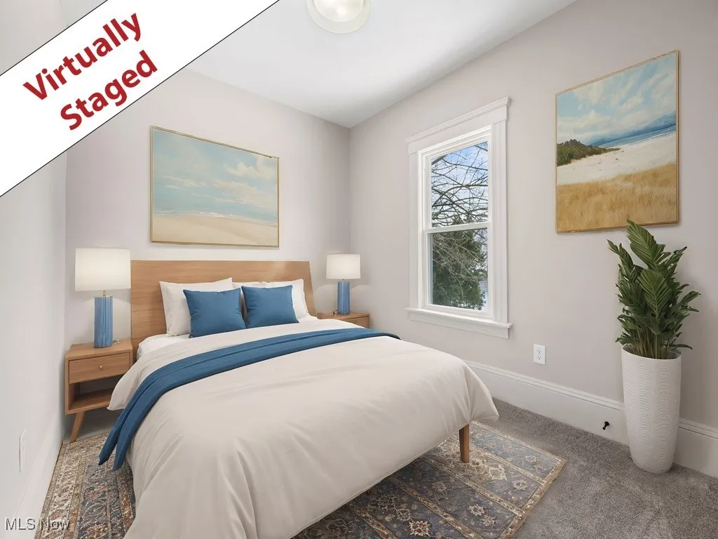 Bedroom featuring baseboards and carpet flooring