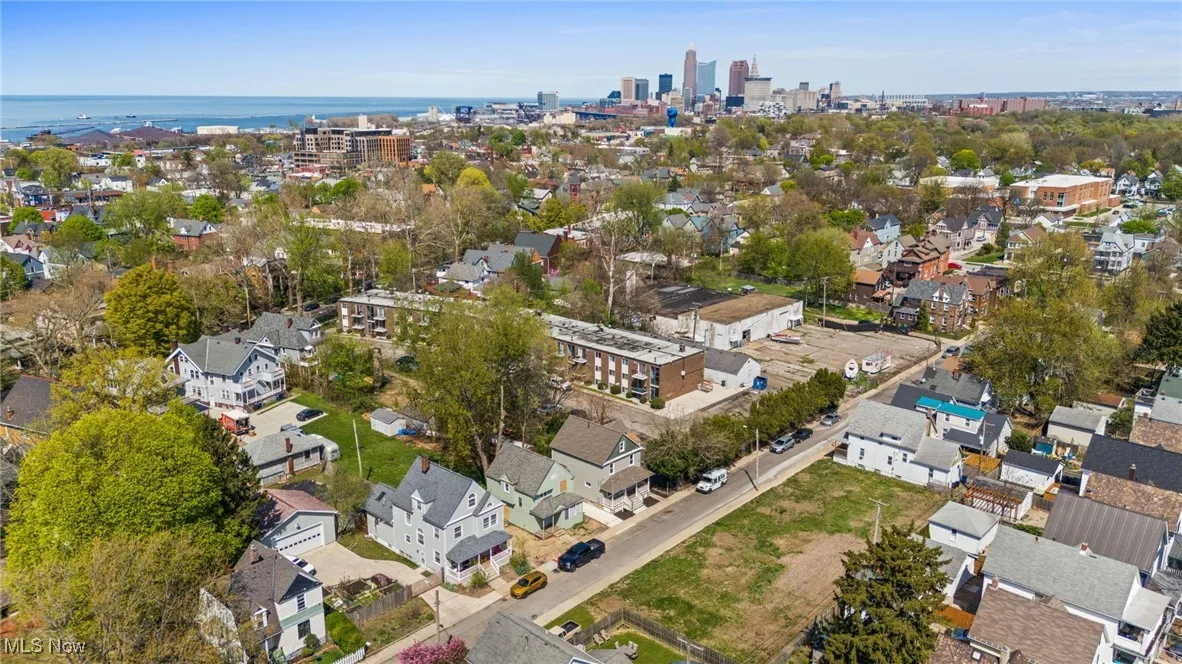 Bird's eye view featuring a water view, a city view, and a residential view
