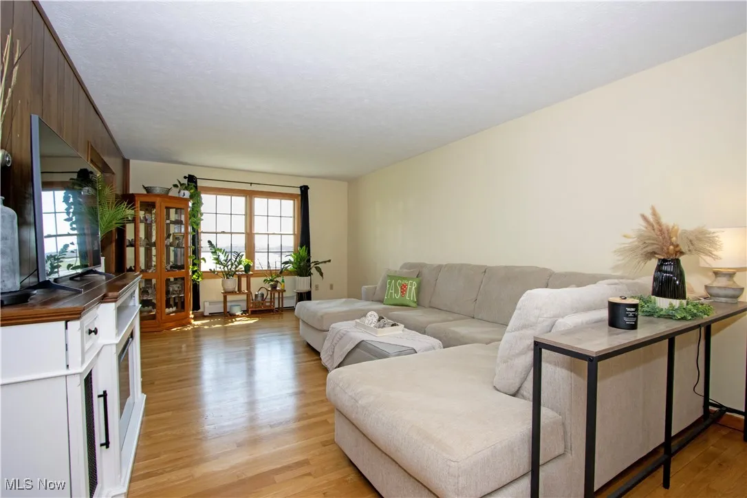 Living area featuring light wood-style floors