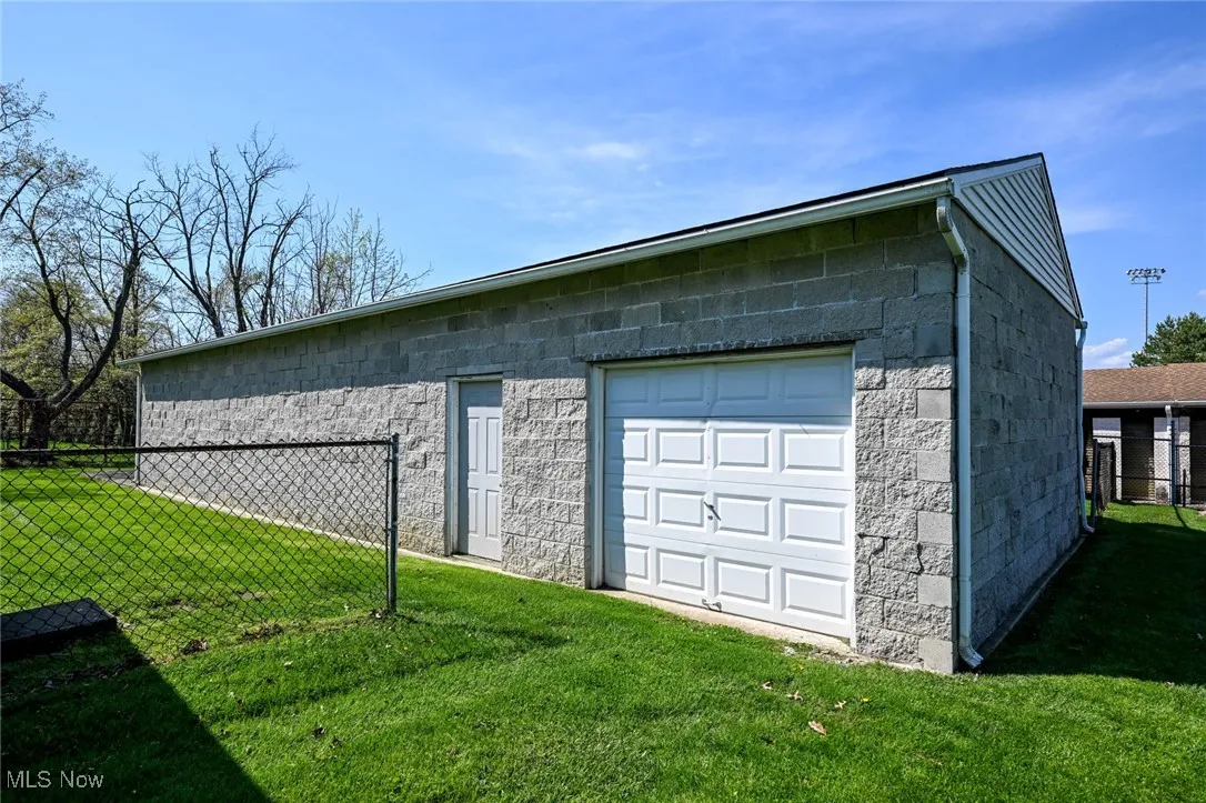 Detached garage with fence