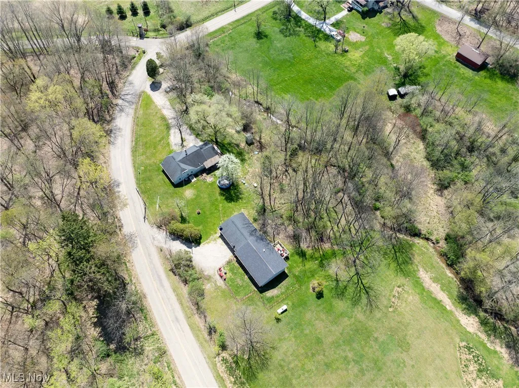 Aerial view of the 2 homes on property