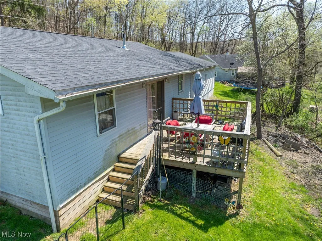 View of back of home with deck area
