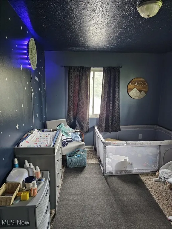 Bedroom with carpet