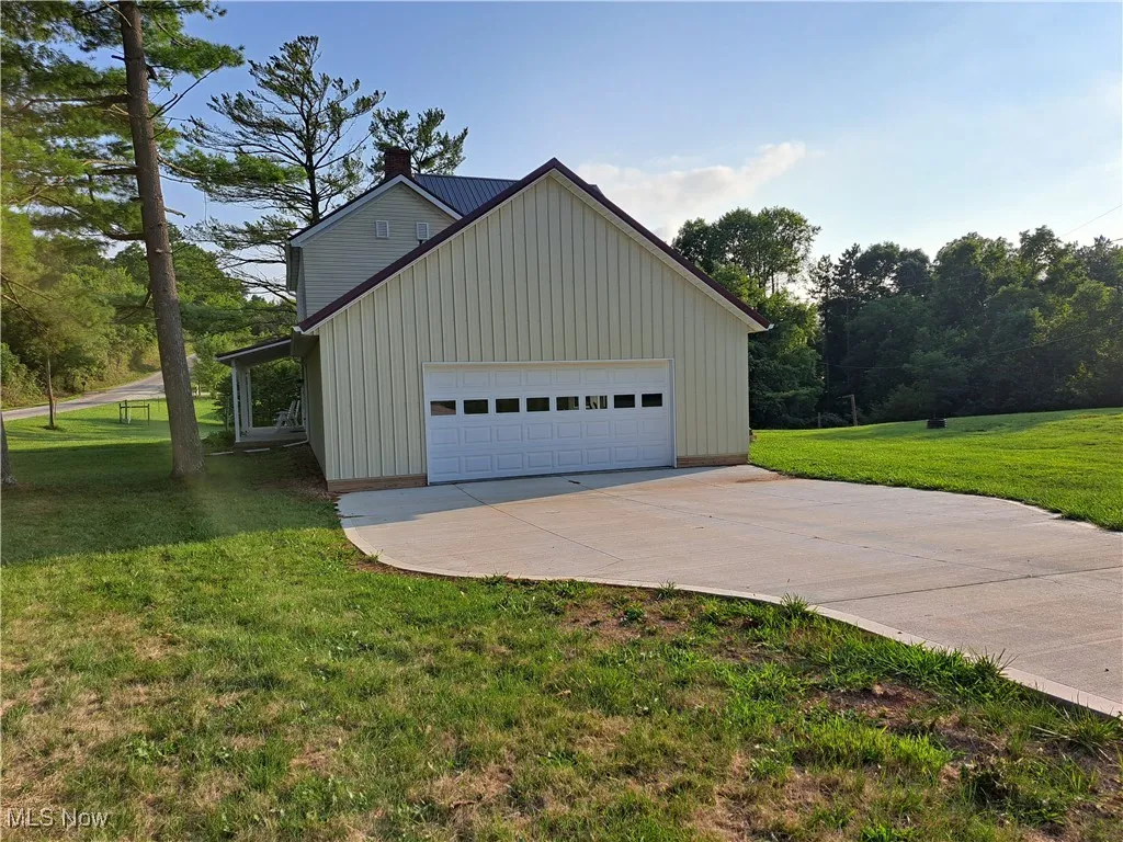 Garage with a lawn