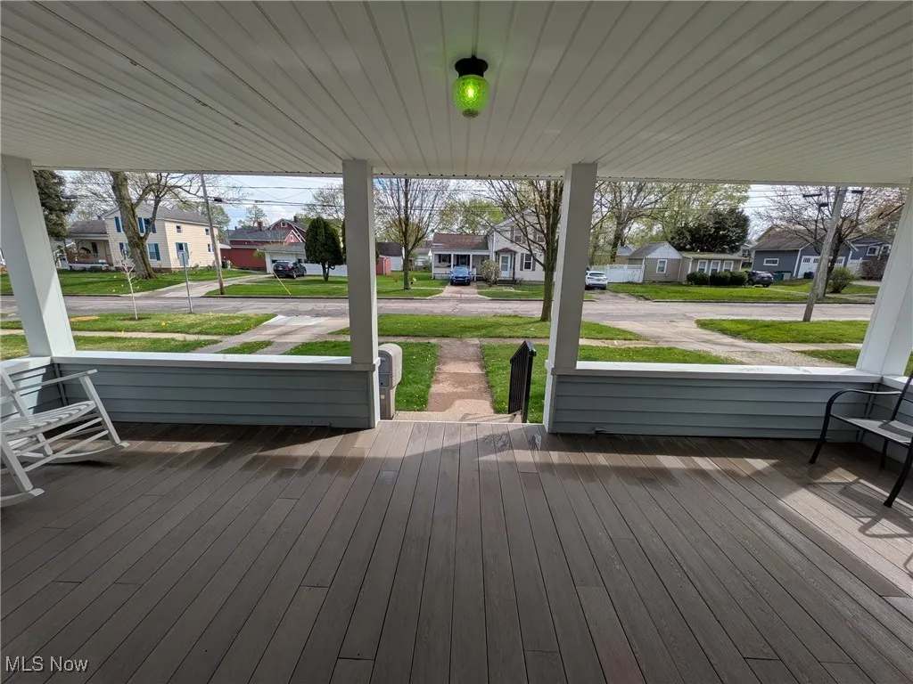 Durable vinyl plank front porch, view from main front entry door