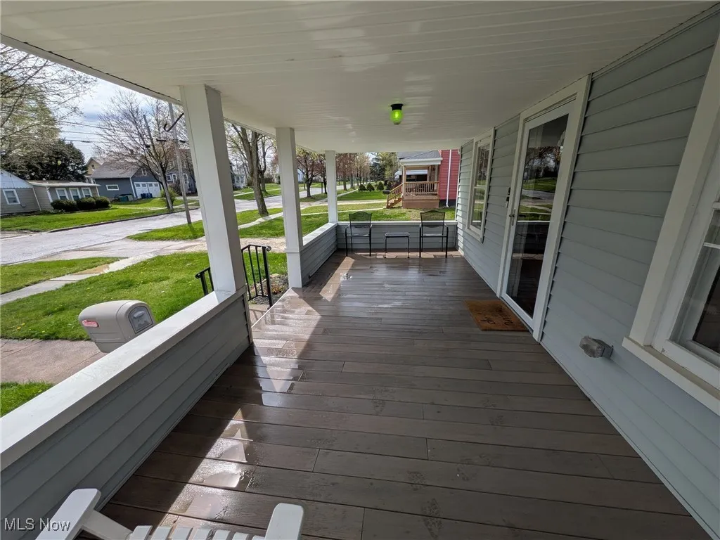 Covered front porch looking west