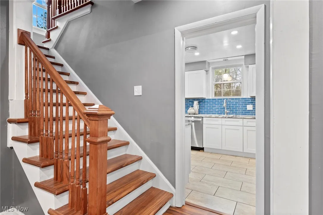 Stairway featuring sink