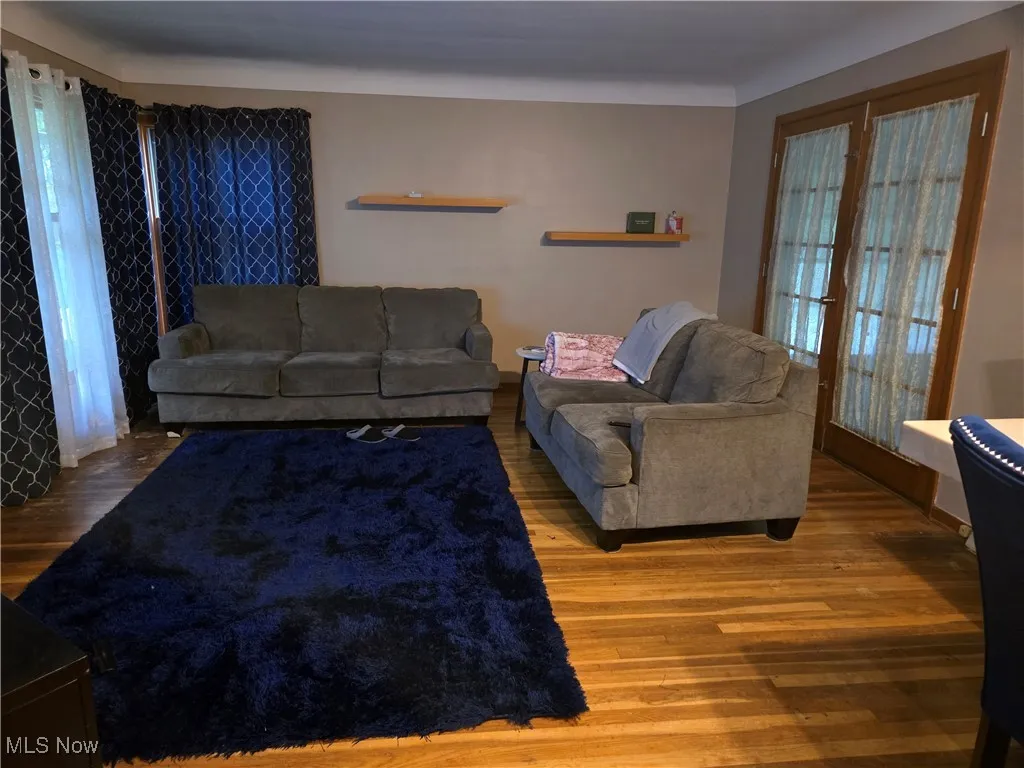 Living area with wood finished floors
