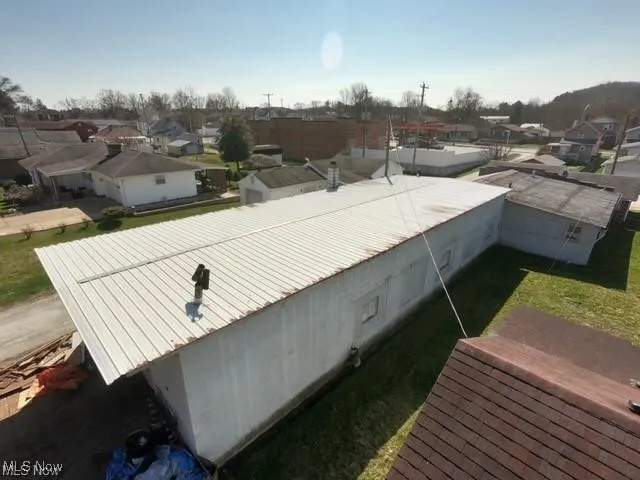 Serial view of side / roof of building