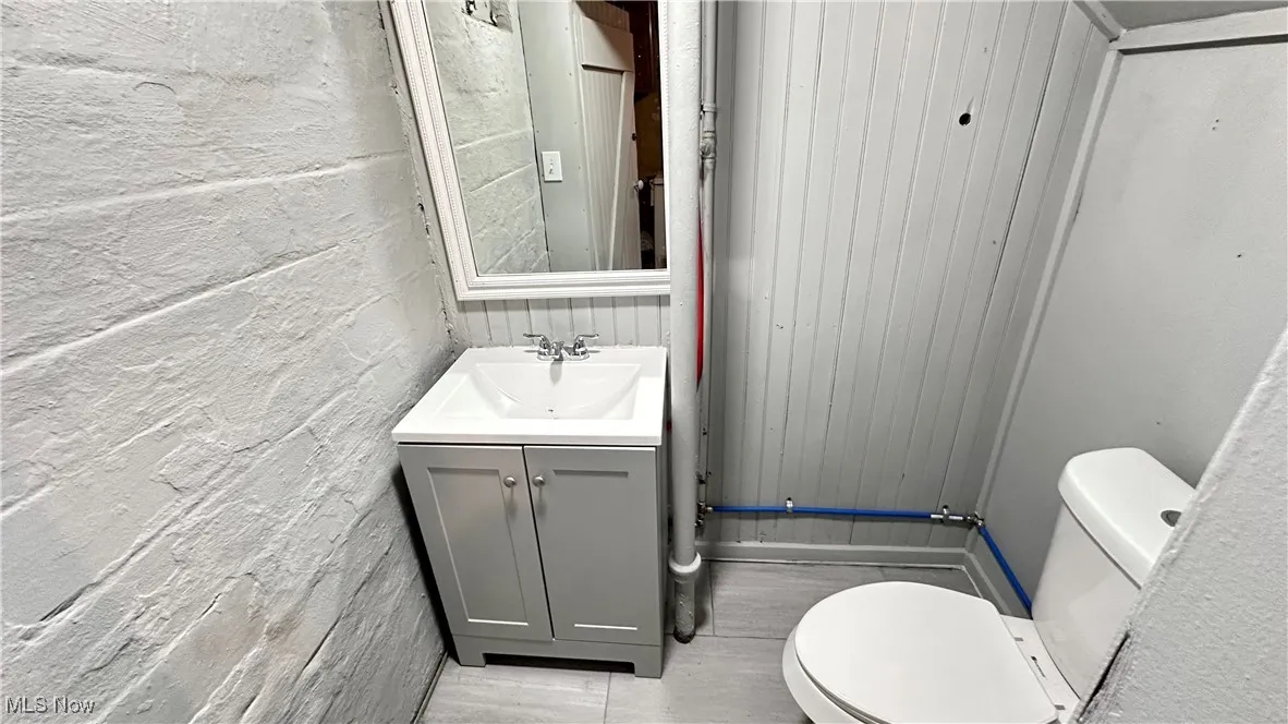 Bathroom featuring toilet and vanity