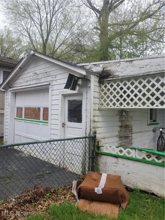 View of side of property with fence