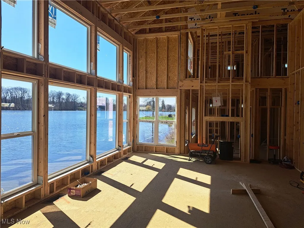 Misc room with a water view and a wealth of natural light