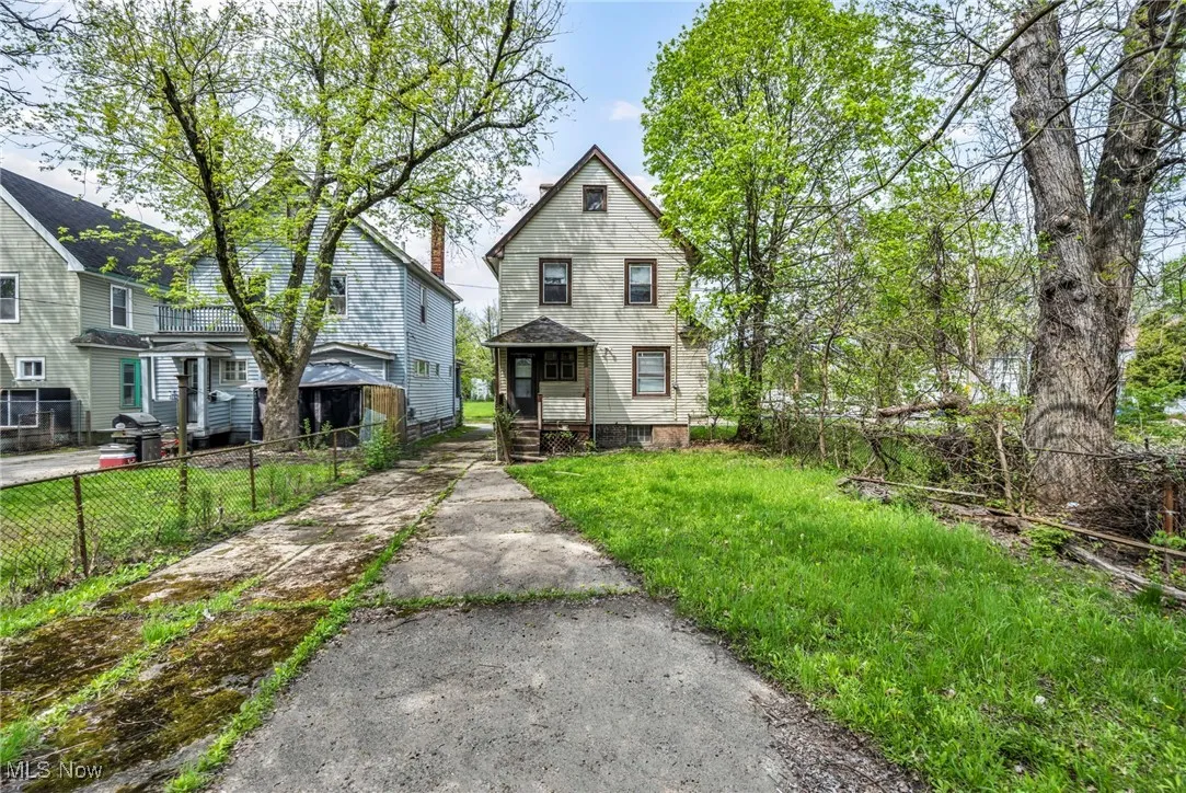 Victorian house with fence