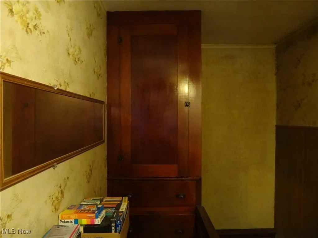 Built in closet at top of steps for storage.