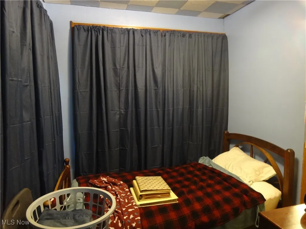 View of first floor room being used for bedroom or could be den, play room or office