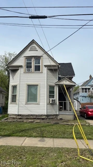 View of front facade with cooling unit