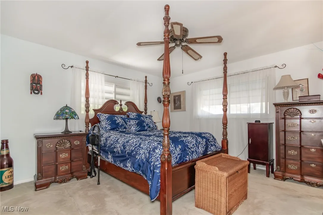 Bedroom featuring carpet floors and a ceiling fan