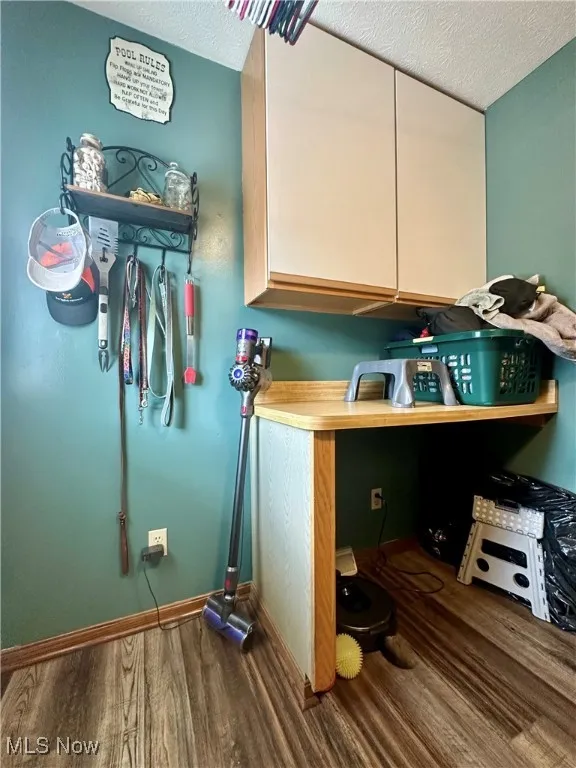 Laundry/mud room with access to the backyard