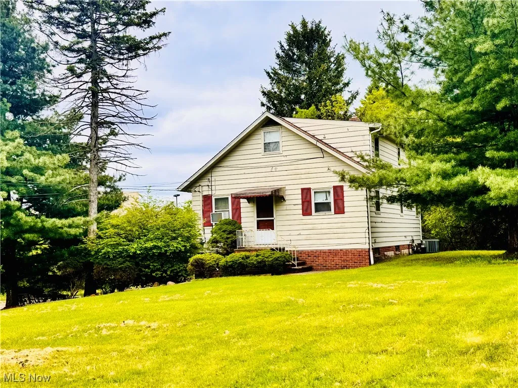 Bungalow-style home featuring a front yard