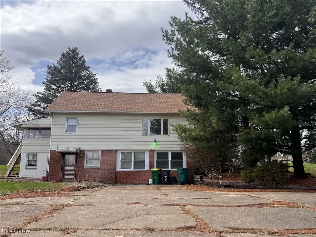 View of front facade with brick siding