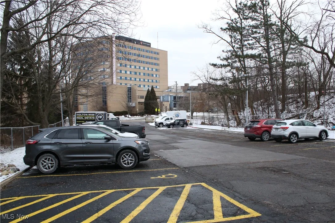 View of uncovered parking lot