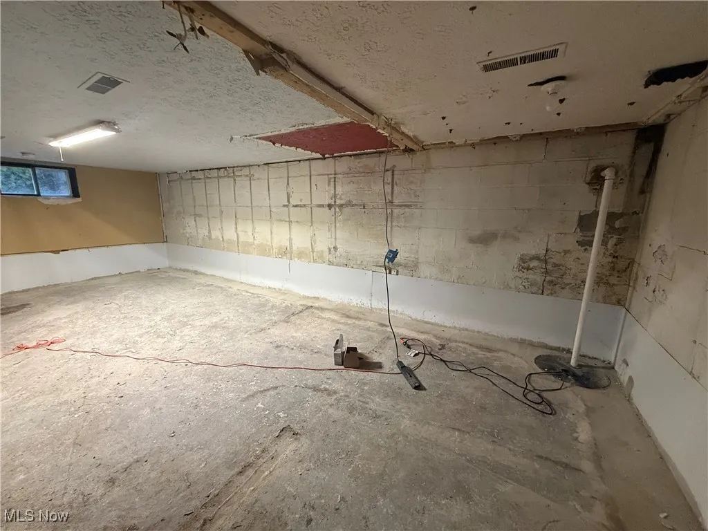 Below grade area with drainage system