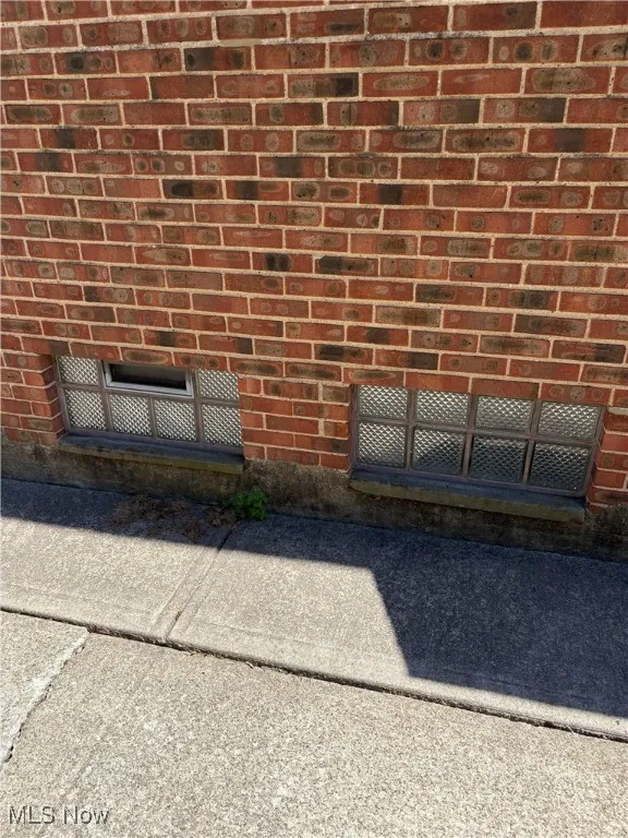 Exterior details featuring brick siding