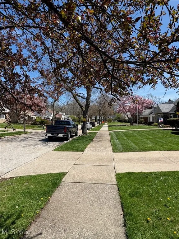 View of street with a residential view and sidewalks