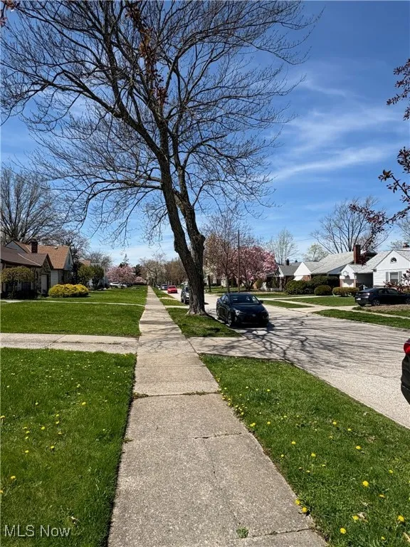View of road with a residential view and sidewalks