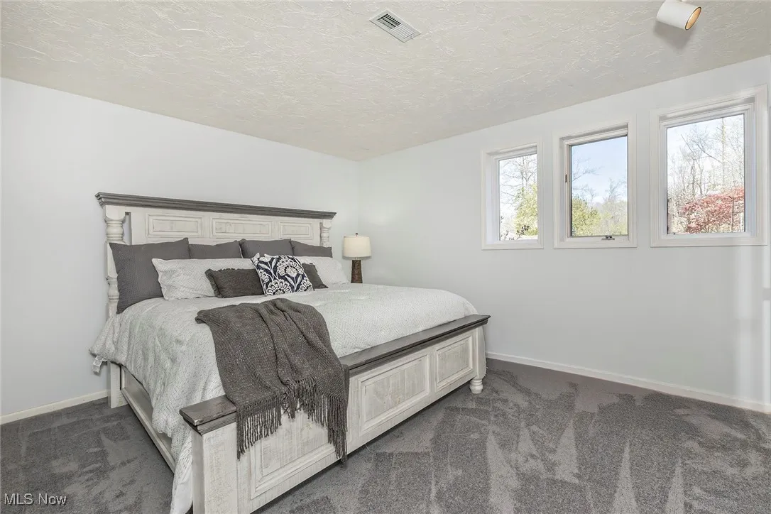 View of one of the three additional Bedrooms, for a total of four.